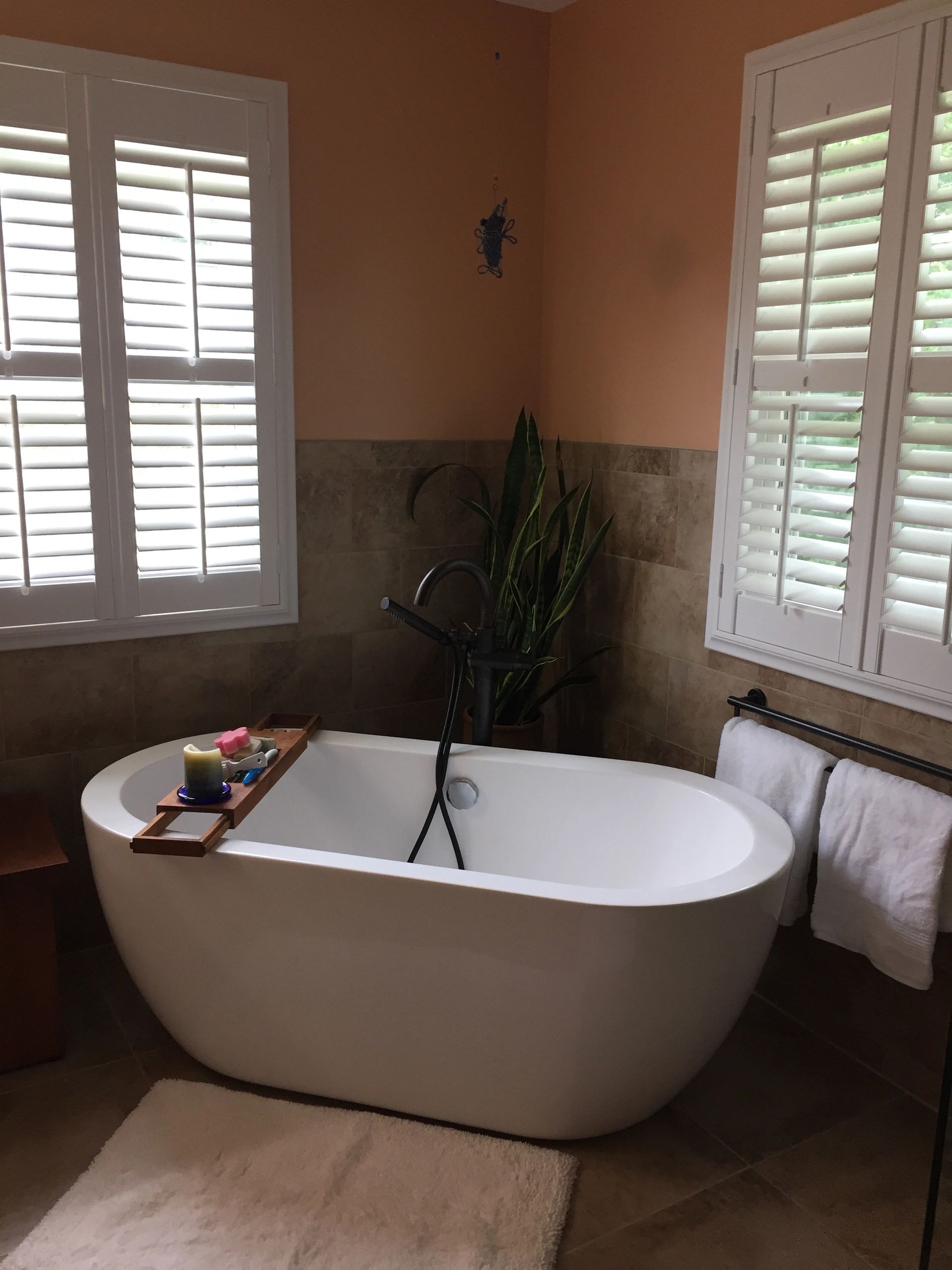 Spa-like bathroom interior design with freestanding bathtub