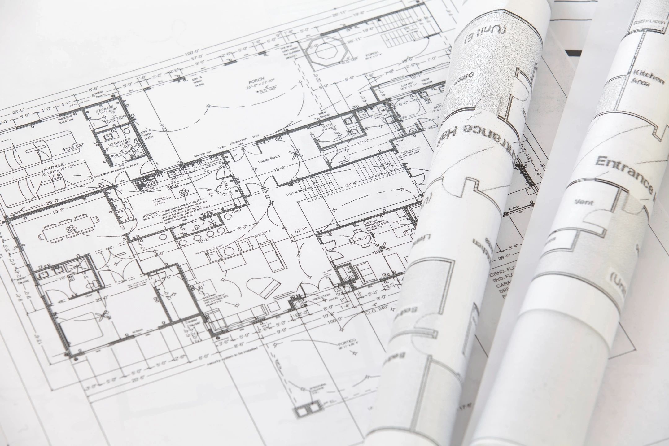 Architectural blueprints and floor plans showing kitchen area layout with measurements and annotations